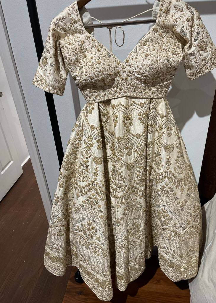 Ivory and Gold Bridal Lehenga Image - 0