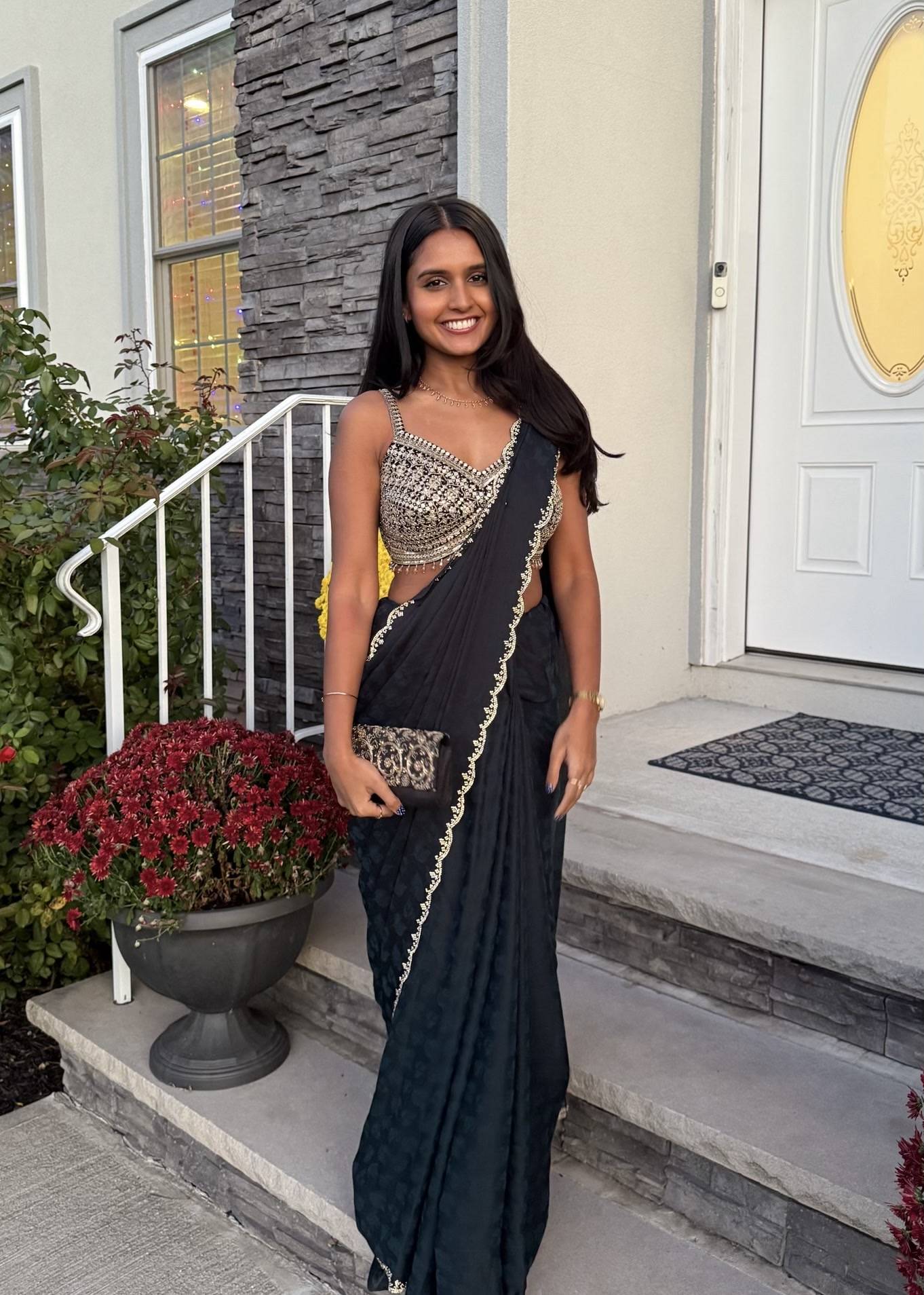 Black and Gold Sari Image - 1