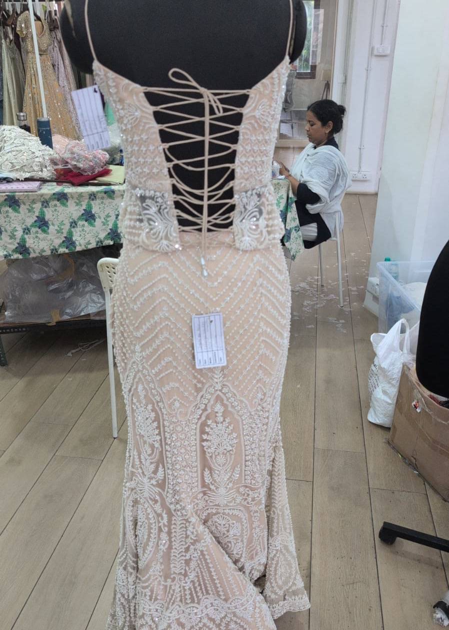Ivory Beaded Peplum Lehenga Image - 2