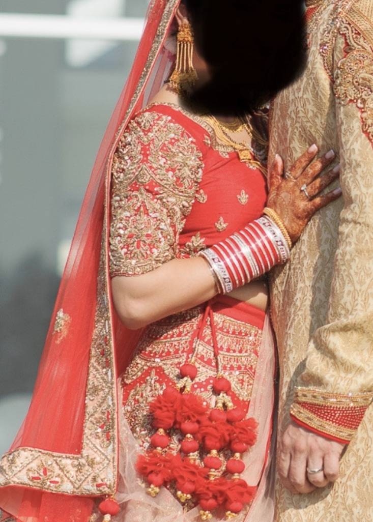 Red and Gold Zardozi Bridal Lehenga Image - 2