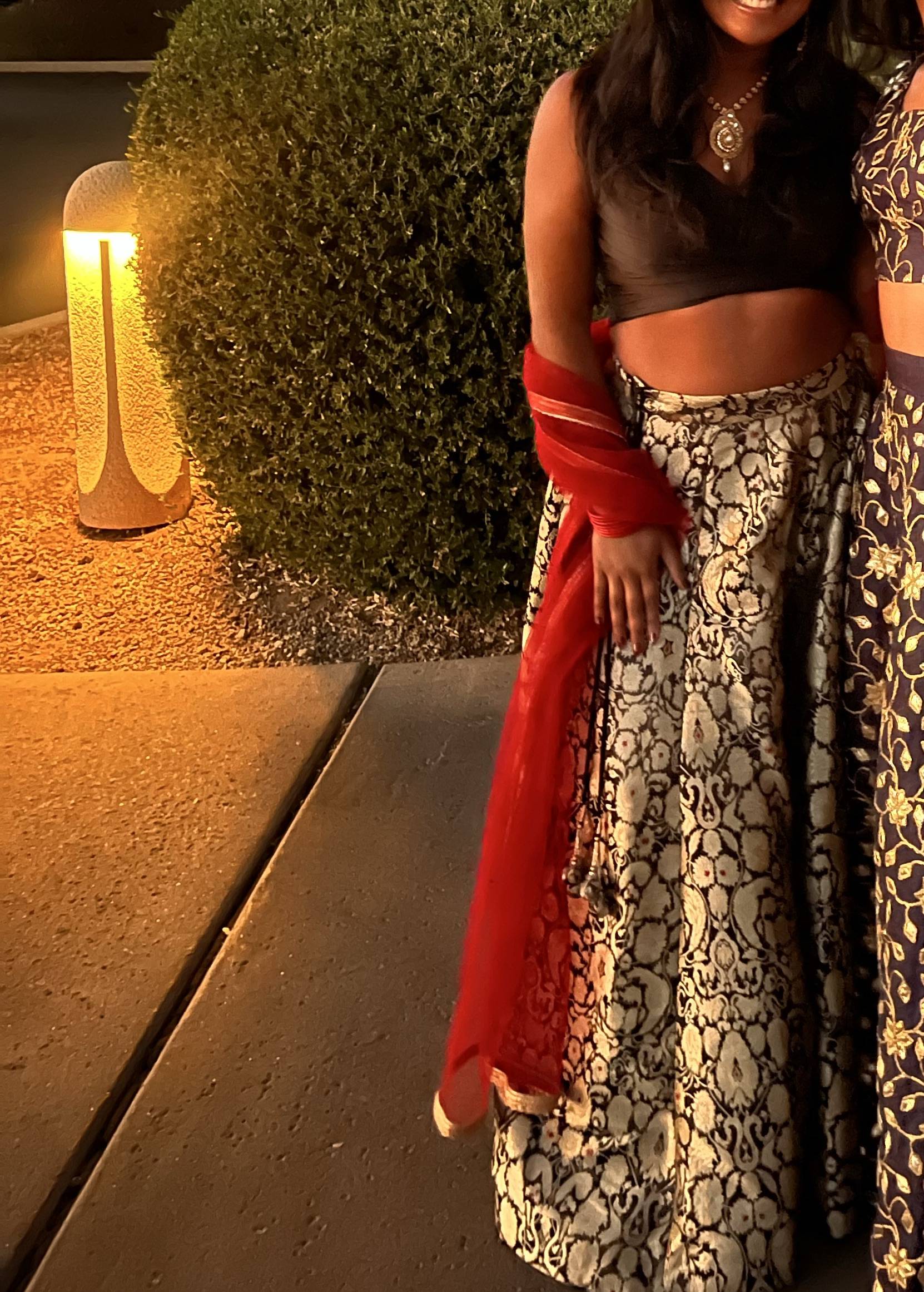 Black & Gold Brocade Lehenga with Red Dupatta Image - 1