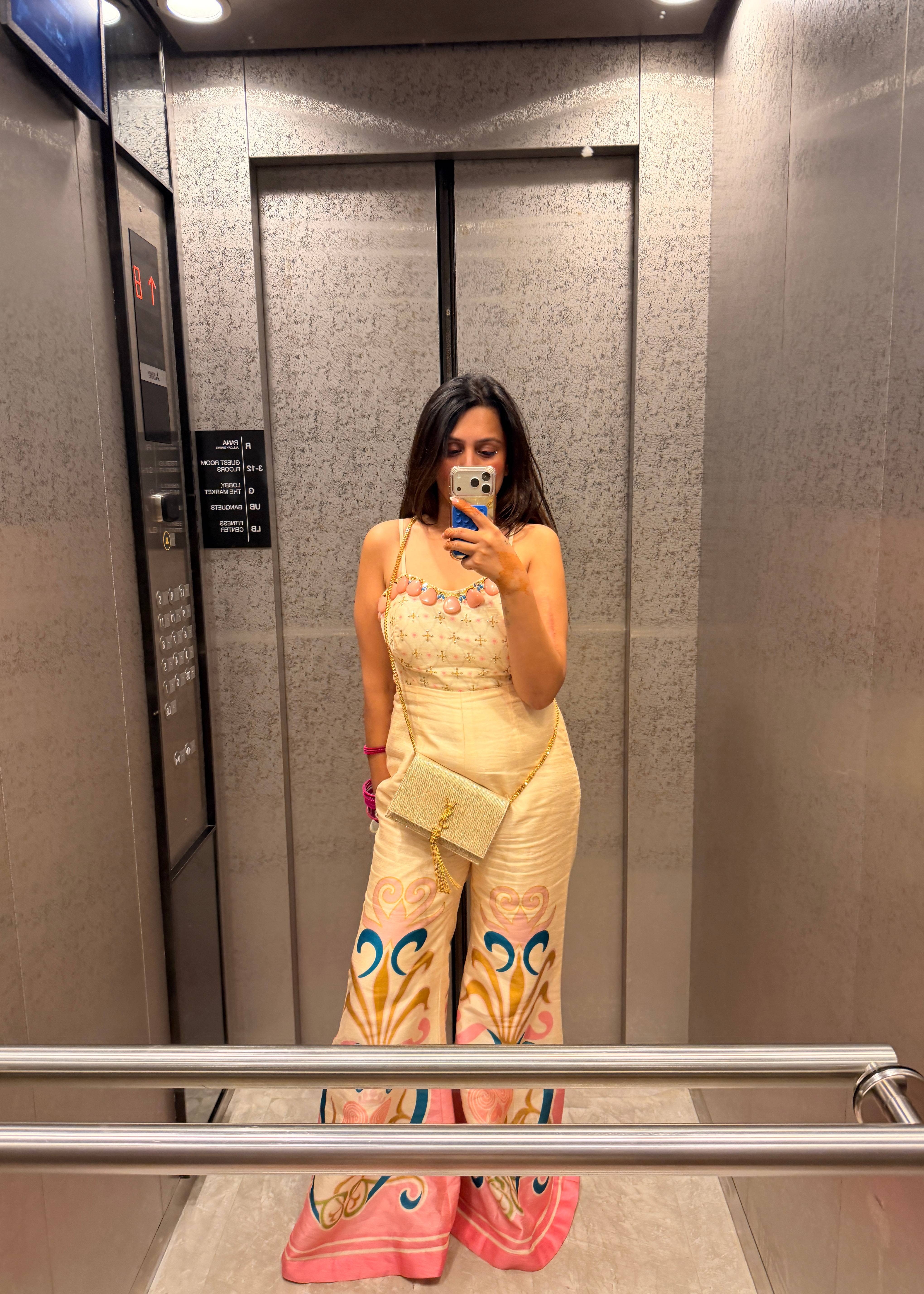Cream Embellished Flared Jumpsuit Image - 1