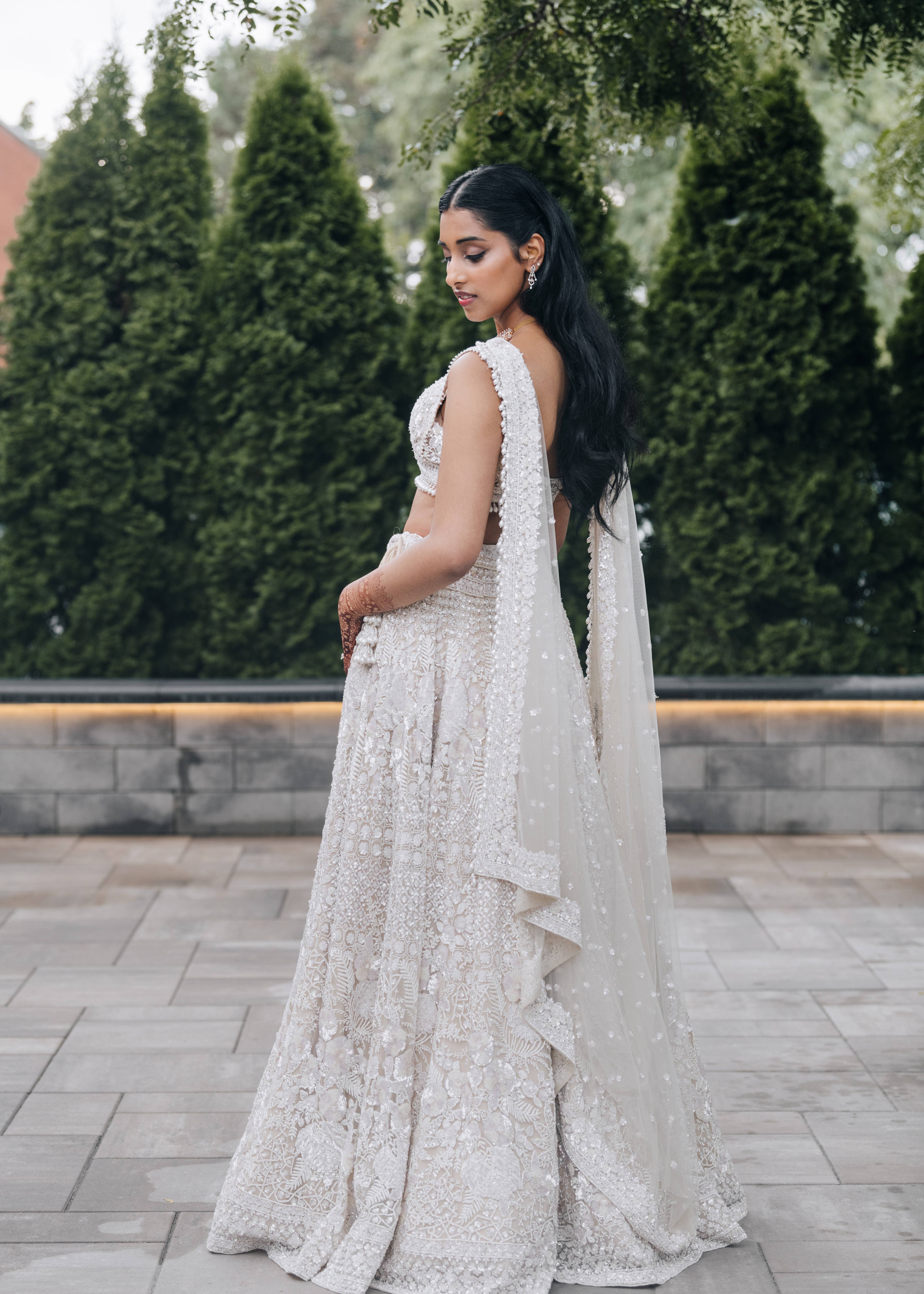 Ivory Pearl Embellished Bridal Lehenga Set Image - 1