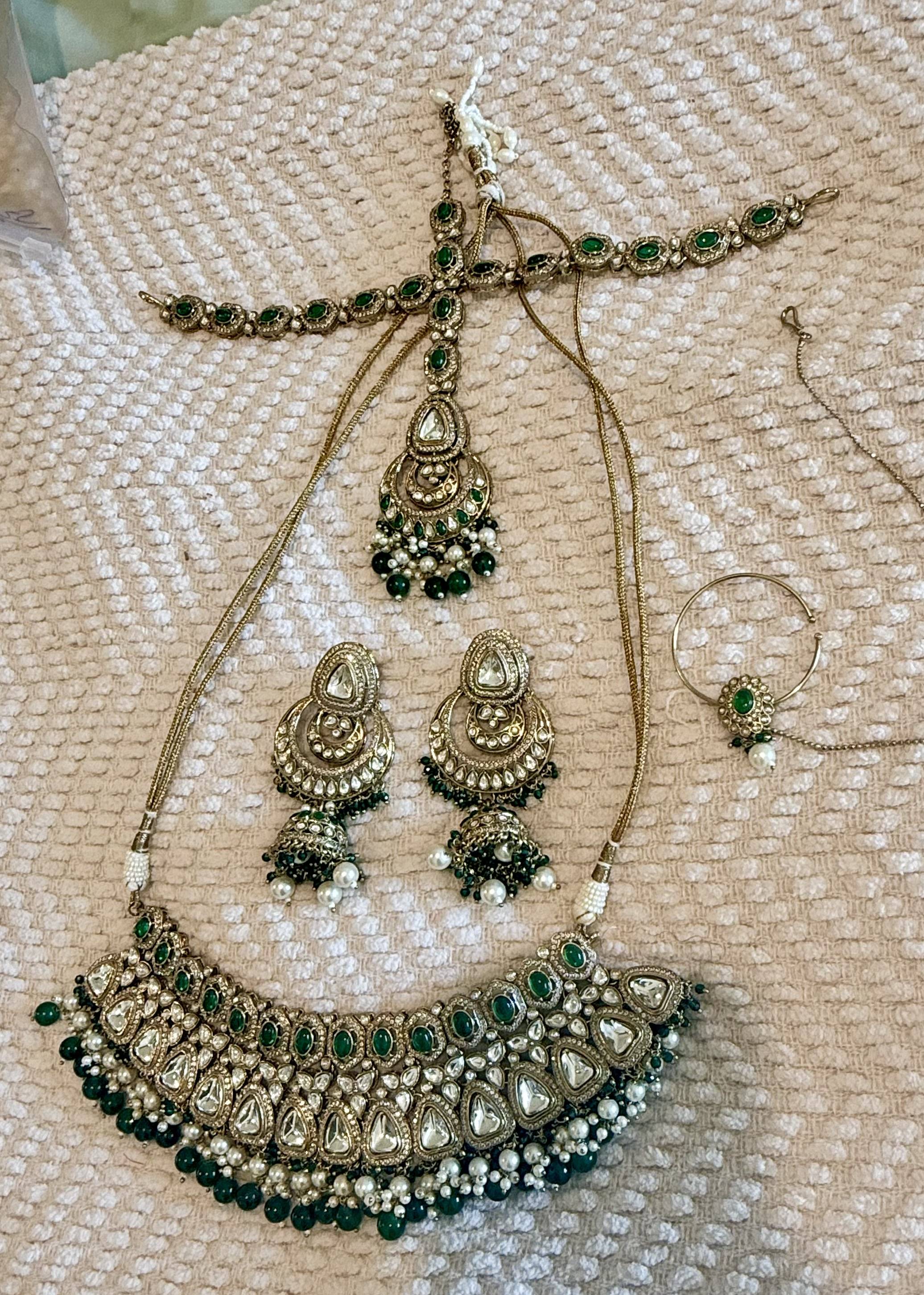 Green Kundan Bridal Necklace Set with Jhumkas and Nath Image - 1